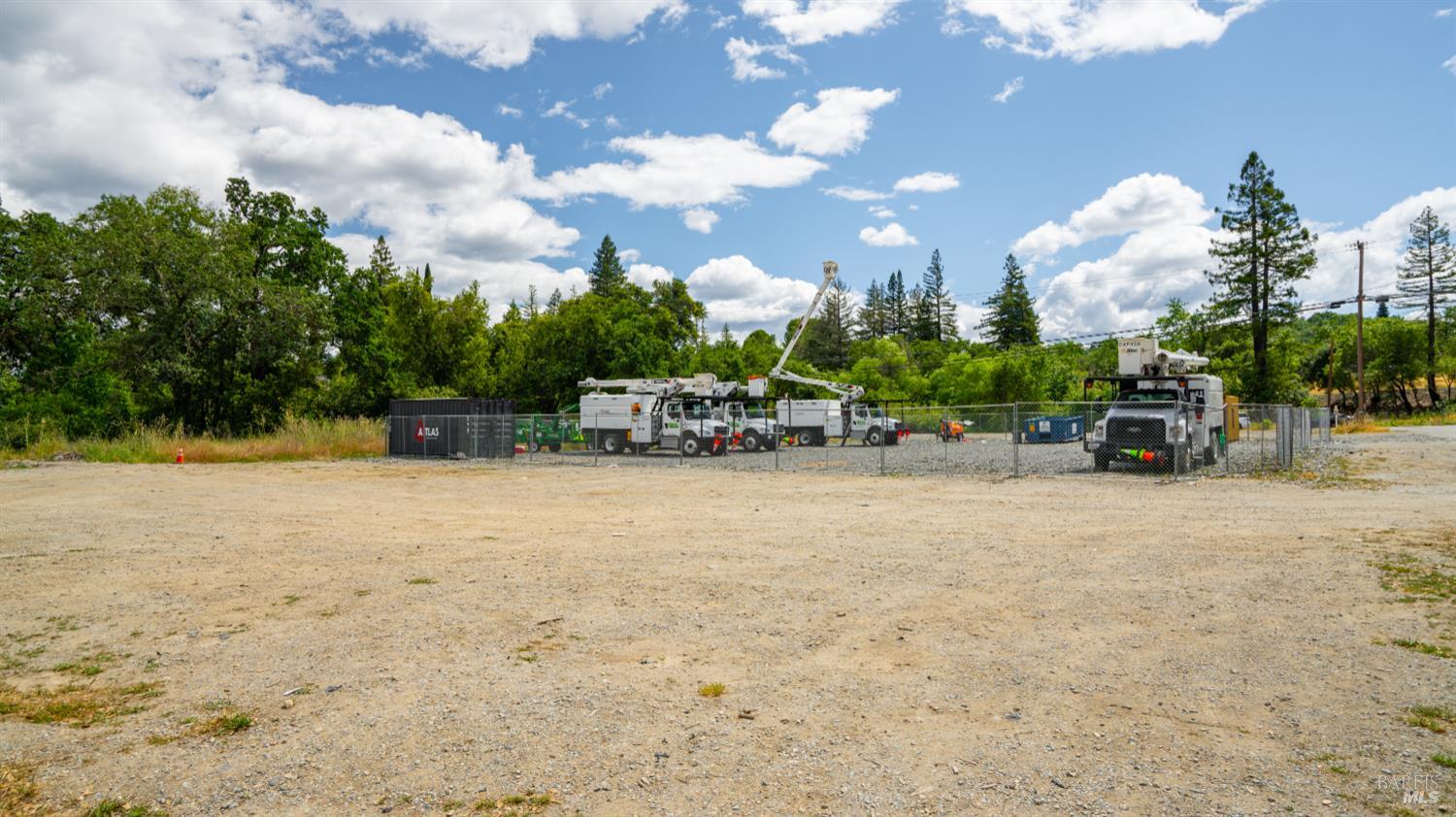 27101 Chrome Iron Road Cloverdale, CA 95425 - Photo 19 of 21 a view of a fountain with a bench in front of house