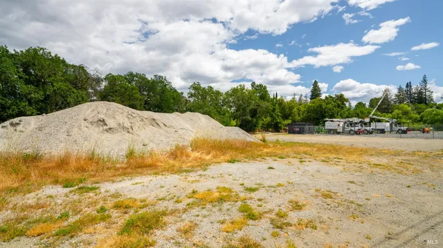 a view of swimming pool with a yard