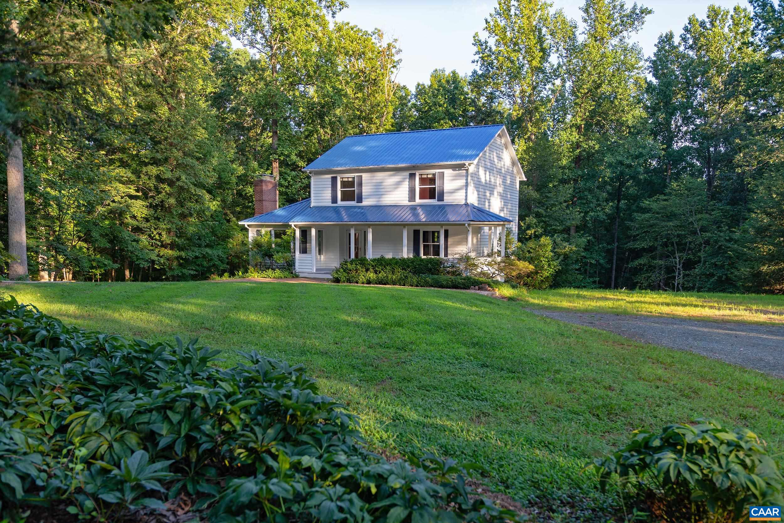 2601 Cardinal Ridge Road Charlottesville, VA 22901 - Photo 1 of 50 a view of a house with a swimming pool