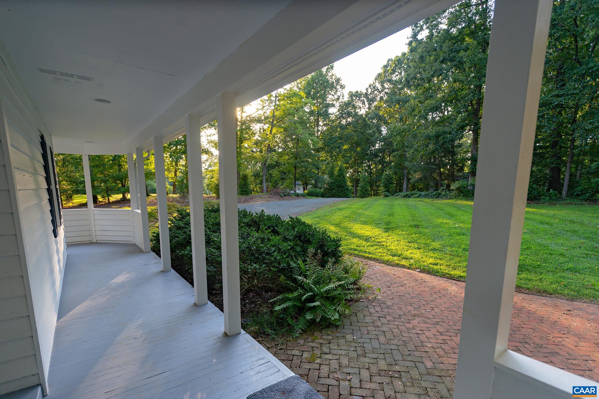 2601 Cardinal Ridge Road Charlottesville, VA 22901 - Photo 2 of 50 a view of a porch with garden