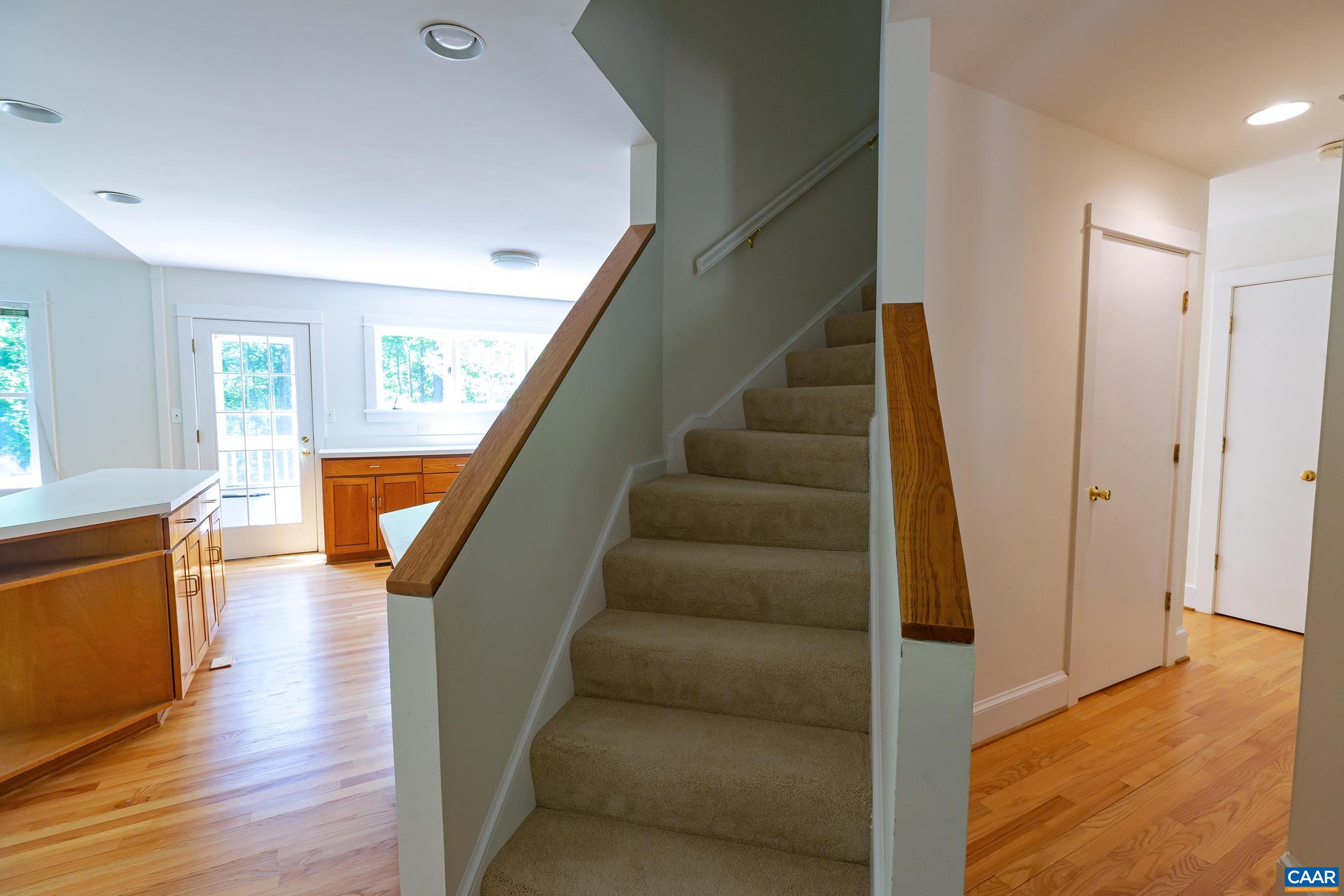 2601 Cardinal Ridge Road Charlottesville, VA 22901 - Photo 22 of 50 a view of staircase with wooden floor and staircase