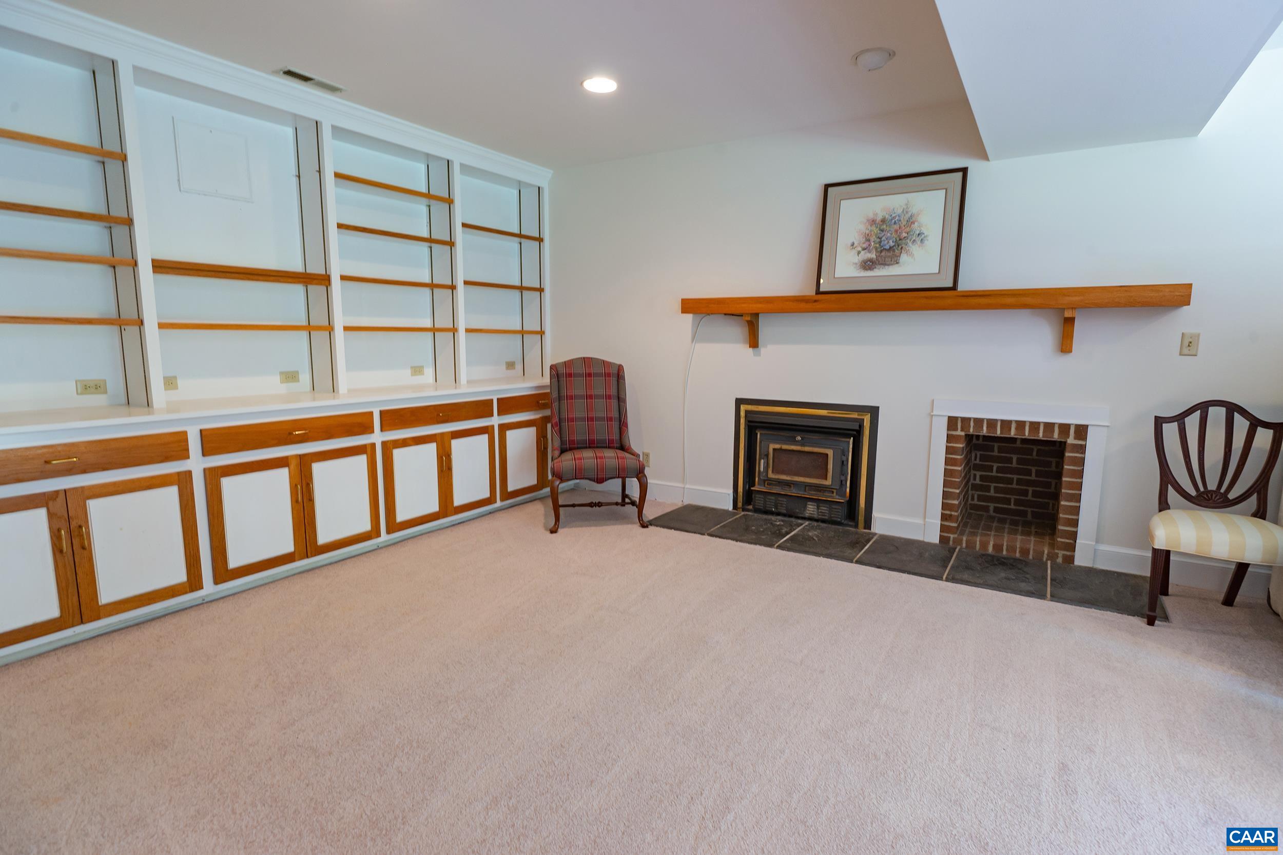 2601 Cardinal Ridge Road Charlottesville, VA 22901 - Photo 35 of 50 a view of a livingroom with furniture and staircase