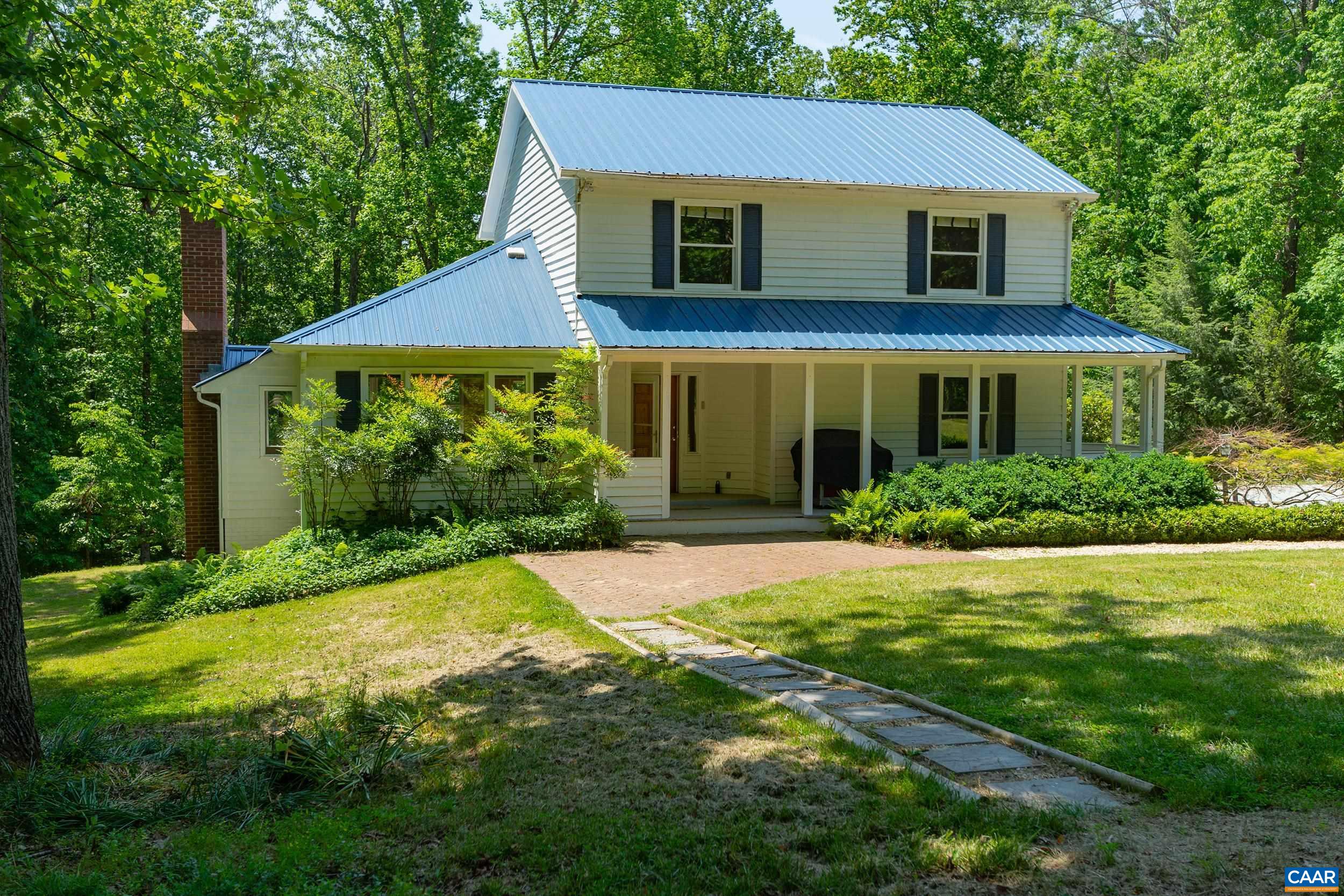 2601 Cardinal Ridge Road Charlottesville, VA 22901 - Photo 44 of 50 a view of a house with a yard
