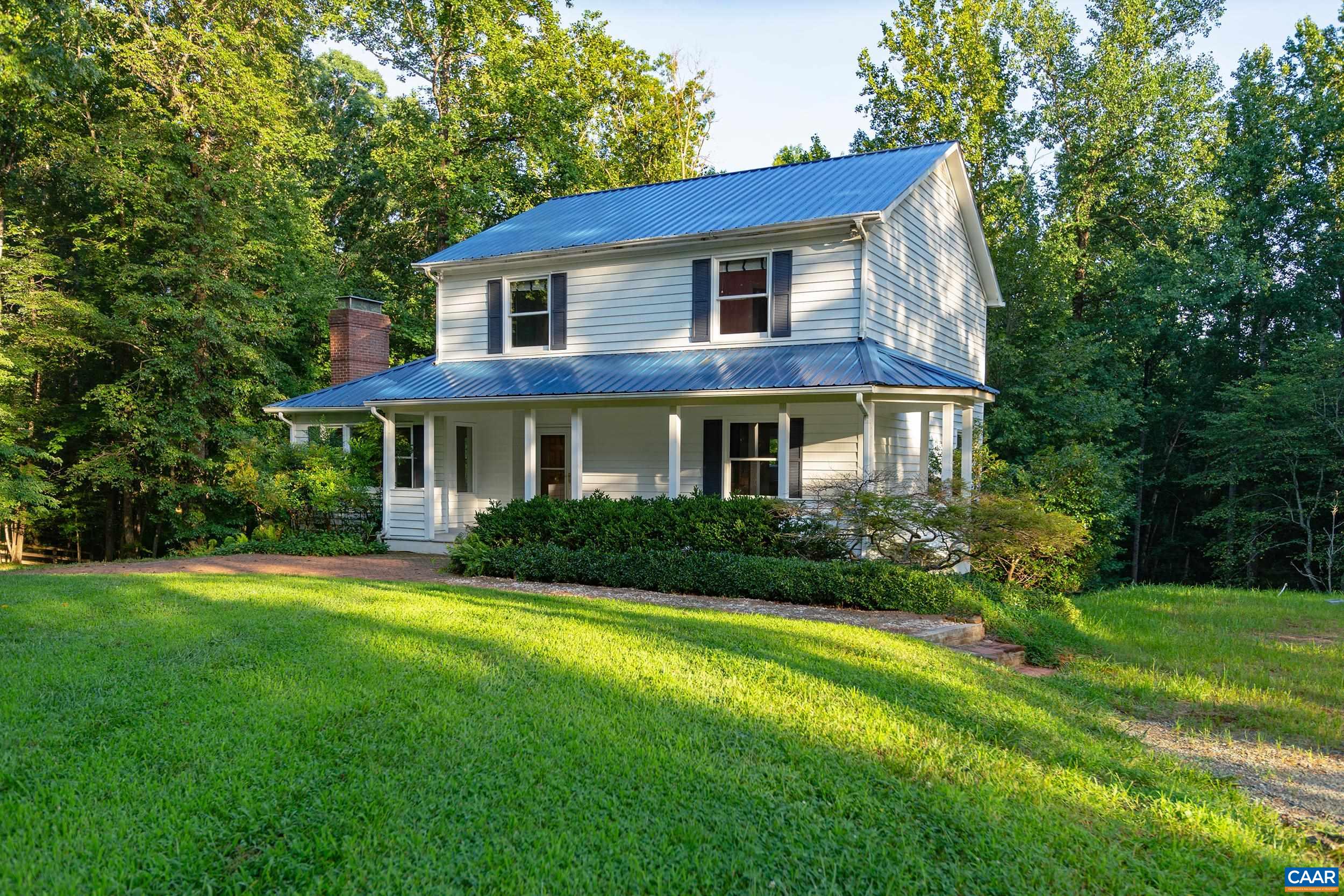 2601 Cardinal Ridge Road Charlottesville, VA 22901 - Photo 45 of 50 a front view of house with yard and green space