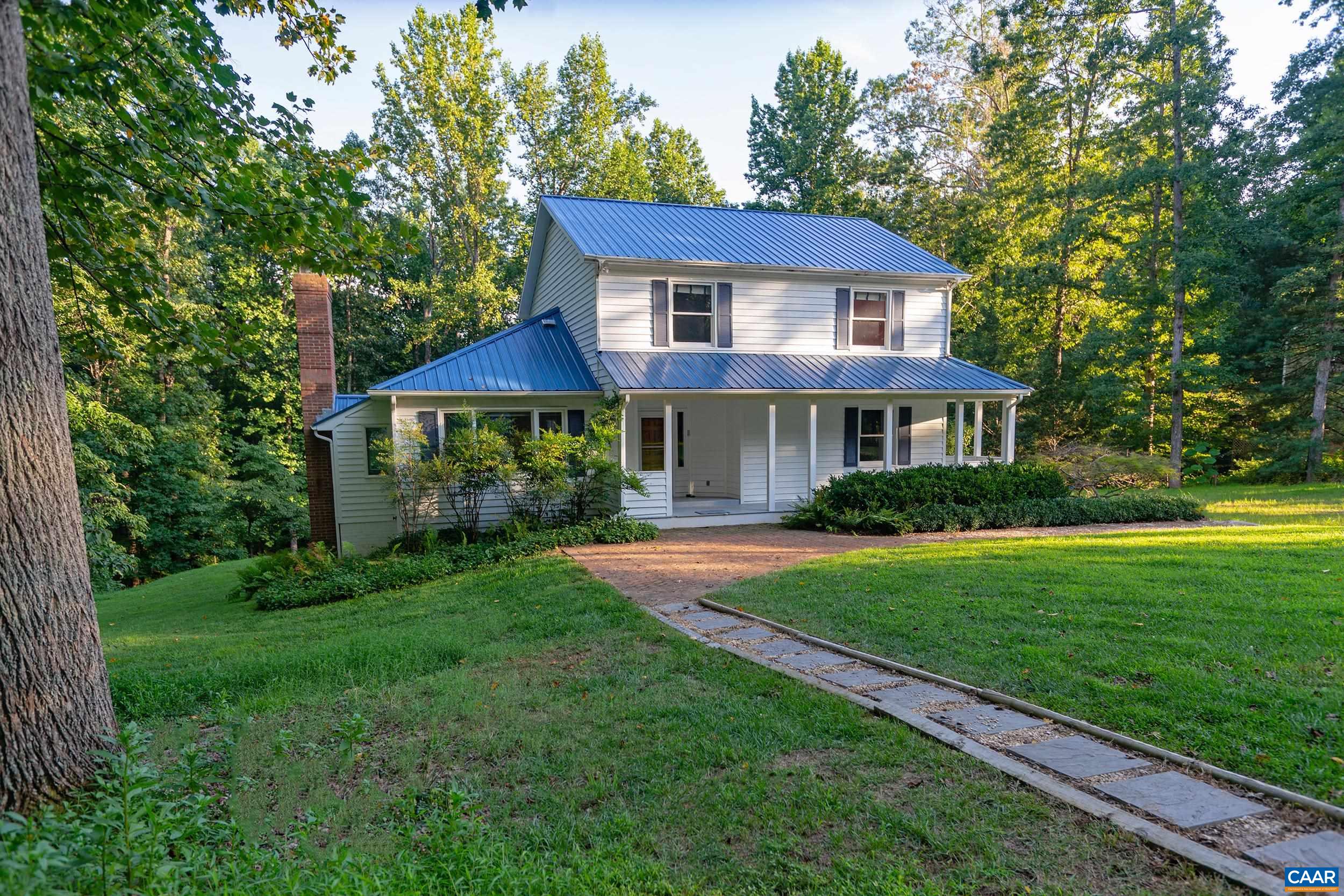 2601 Cardinal Ridge Road Charlottesville, VA 22901 - Photo 48 of 50 a front view of a house with a yard