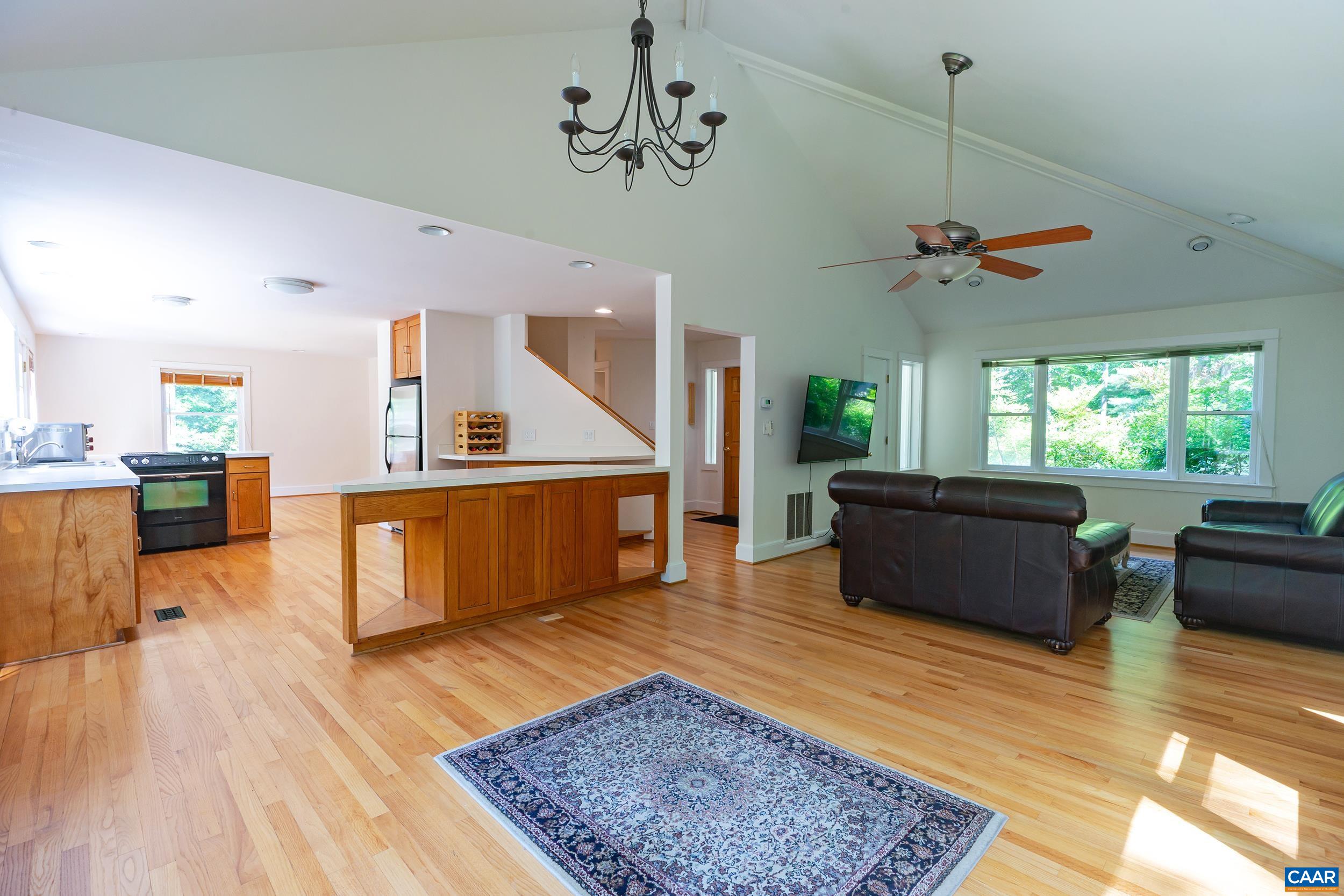2601 Cardinal Ridge Road Charlottesville, VA 22901 - Photo 5 of 50 a living room with furniture and a wooden floor