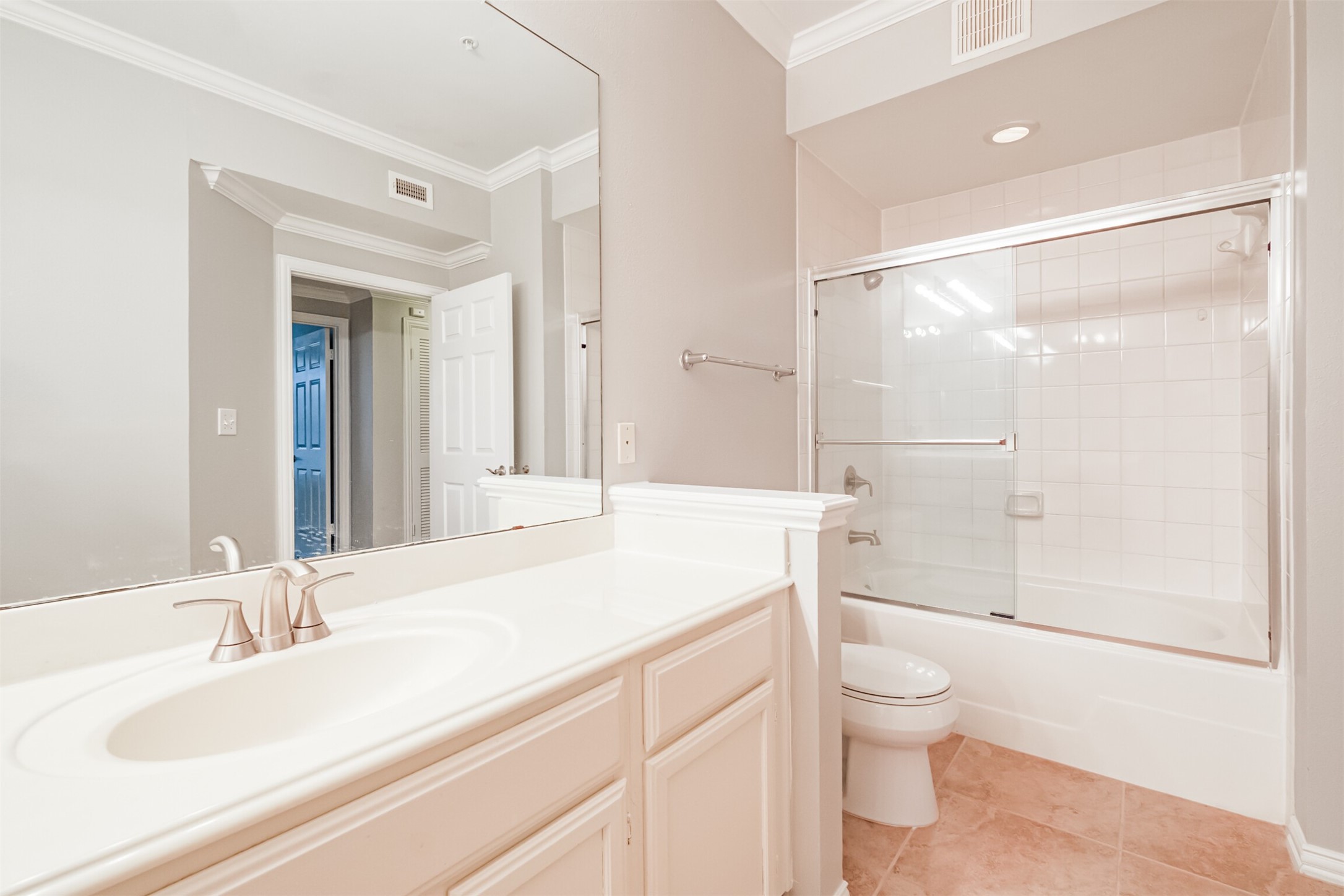 2111 Welch Street, Unit B304 Houston, TX 77019 - Photo 23 of 37 a bathroom with a sink a toilet and shower
