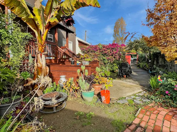 a backyard of a house with lots of green space