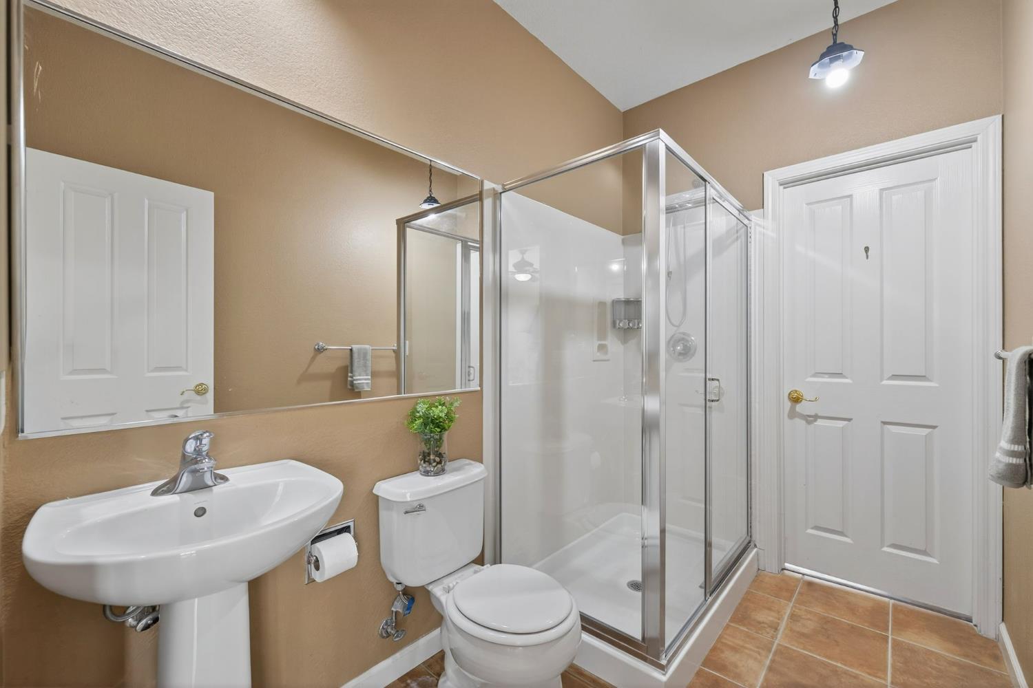 1716 Presidio Way Plumas Lake, CA 95961 - Photo 21 of 43 a bathroom with a sink toilet and shower