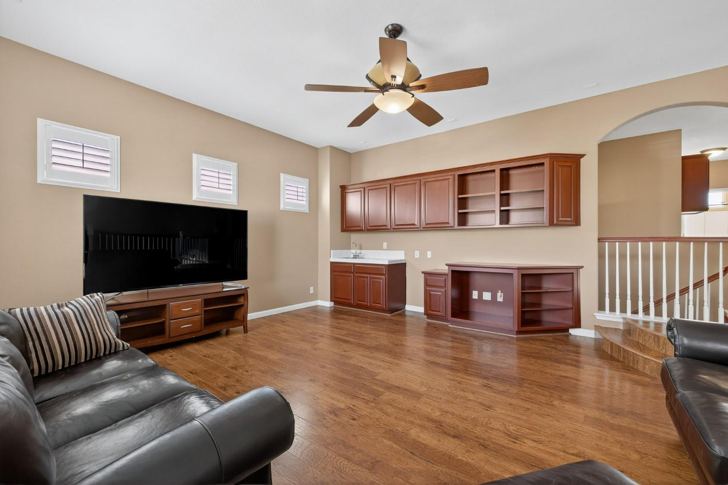 1716 Presidio Way Plumas Lake, CA 95961 - Photo 27 of 43 a living room with furniture and a flat screen tv