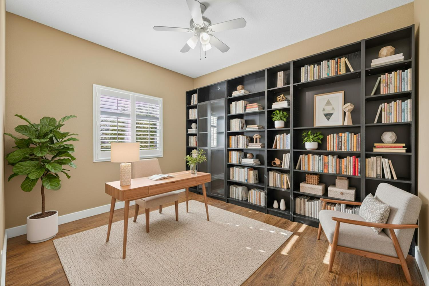 1716 Presidio Way Plumas Lake, CA 95961 - Photo 30 of 43 a living room with furniture and a book shelf