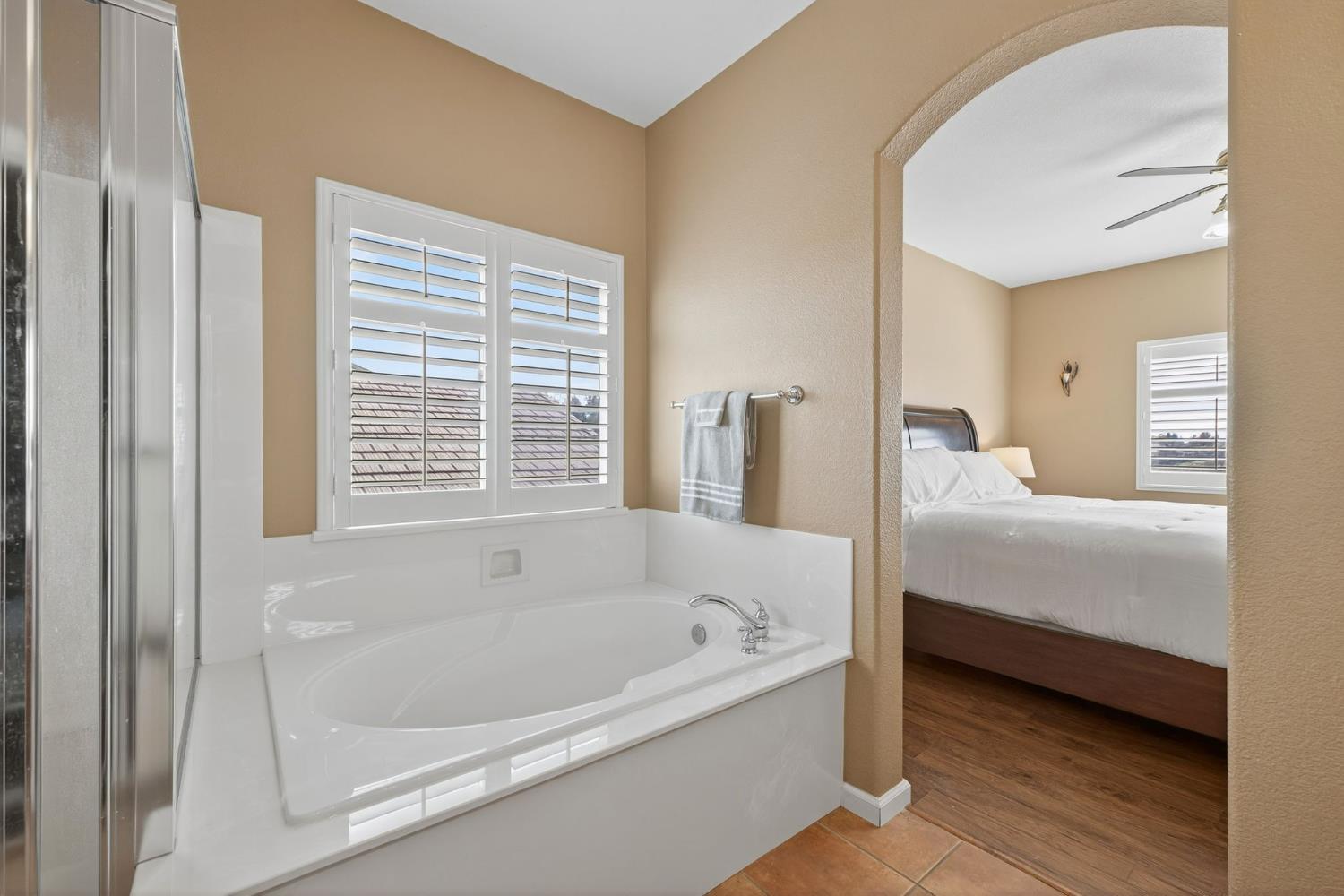 1716 Presidio Way Plumas Lake, CA 95961 - Photo 37 of 43 a bathroom with bathtub and a window