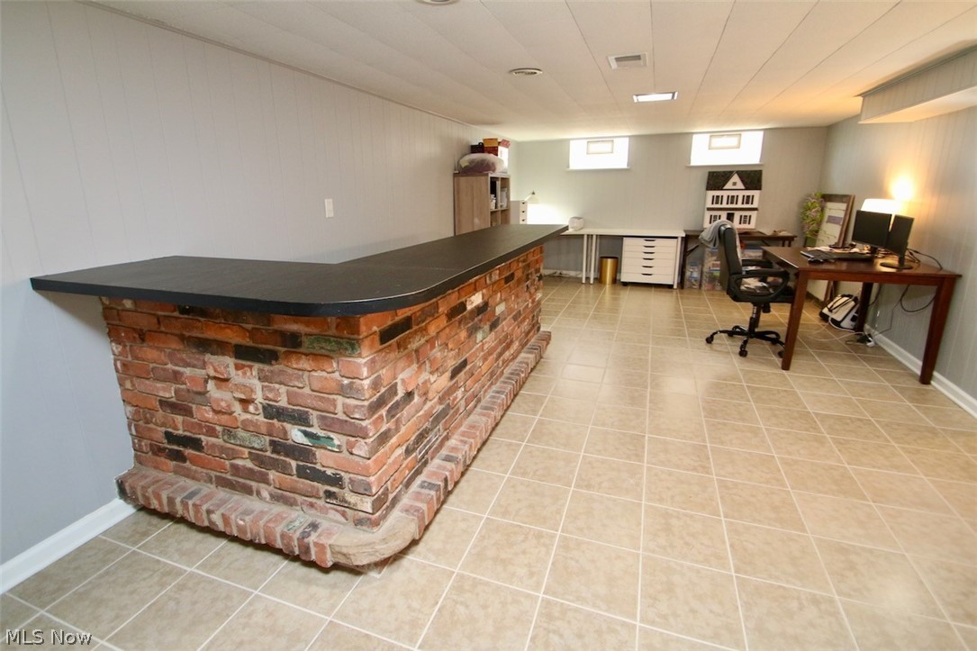 30875 Roosevelt Road Wickliffe, OH 44092 - Photo 31 of 35 Lower level rec room with bar.