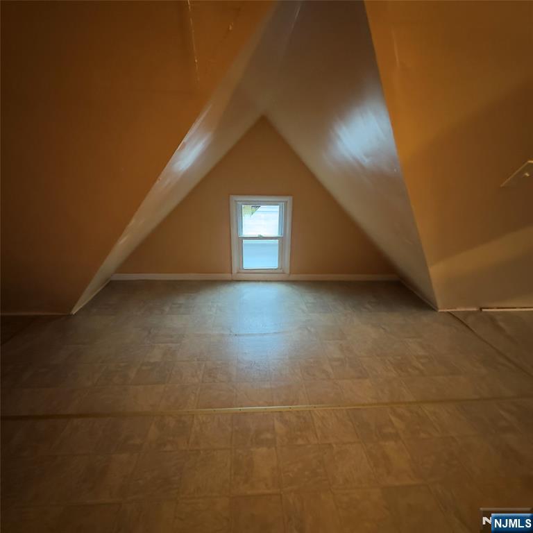 68 Atlantic Street Carteret, NJ 07008 - Photo 12 of 38 a view of empty room with windows