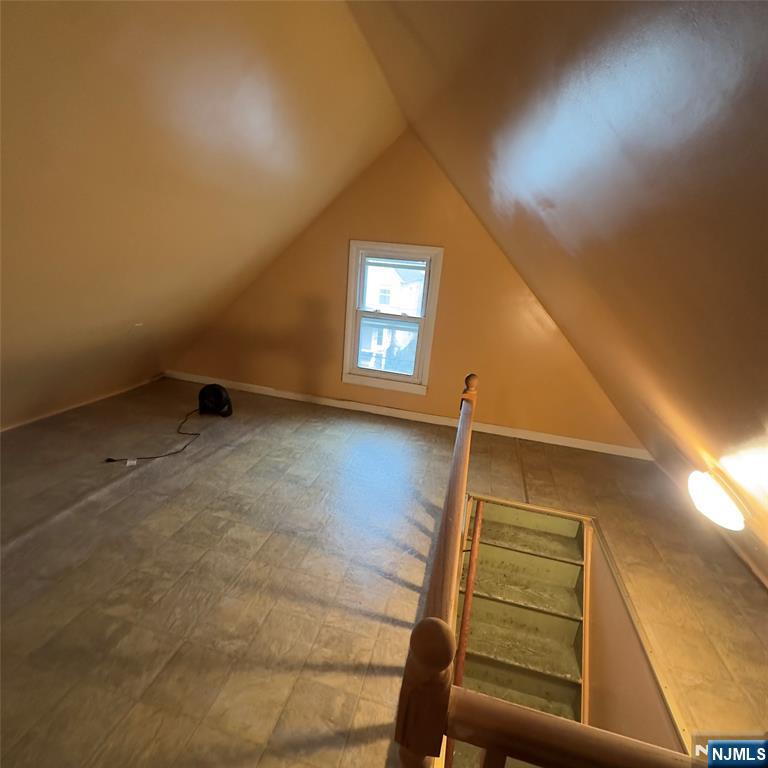 68 Atlantic Street Carteret, NJ 07008 - Photo 15 of 38 a view of room with window and wooden floor