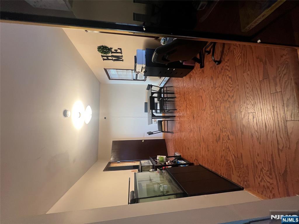 68 Atlantic Street Carteret, NJ 07008 - Photo 20 of 38 a view of a dining room with furniture a rug and wooden floor