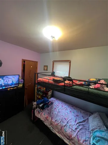 a kitchen with furniture and a stove