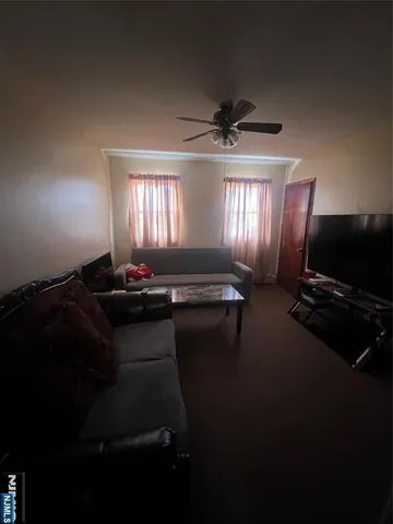 a view of hallway with bathroom