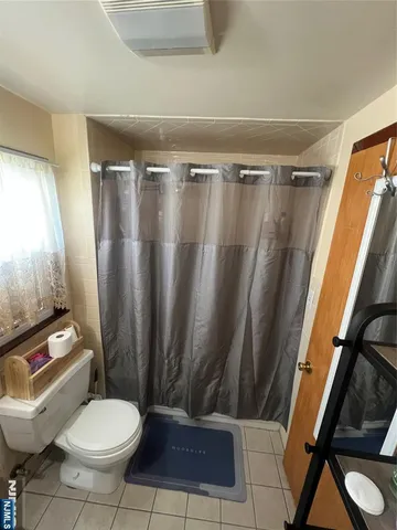 a bedroom with a bed and furniture