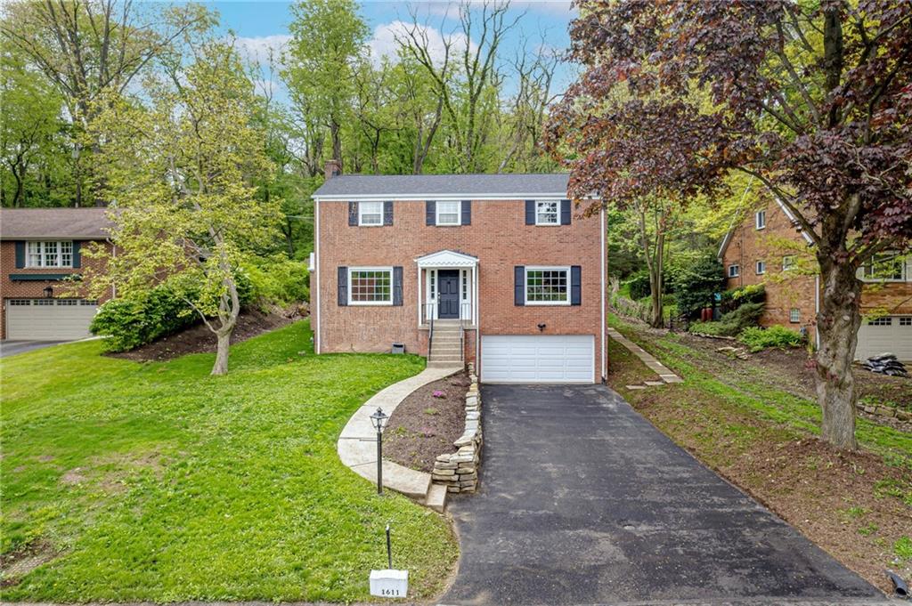 1611 Branning Road Pittsburgh, PA 15235 - Photo 1 of 38 a view of a house with a yard