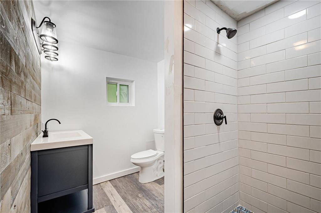 1611 Branning Road Pittsburgh, PA 15235 - Photo 12 of 38 a bathroom with a sink a toilet and shower