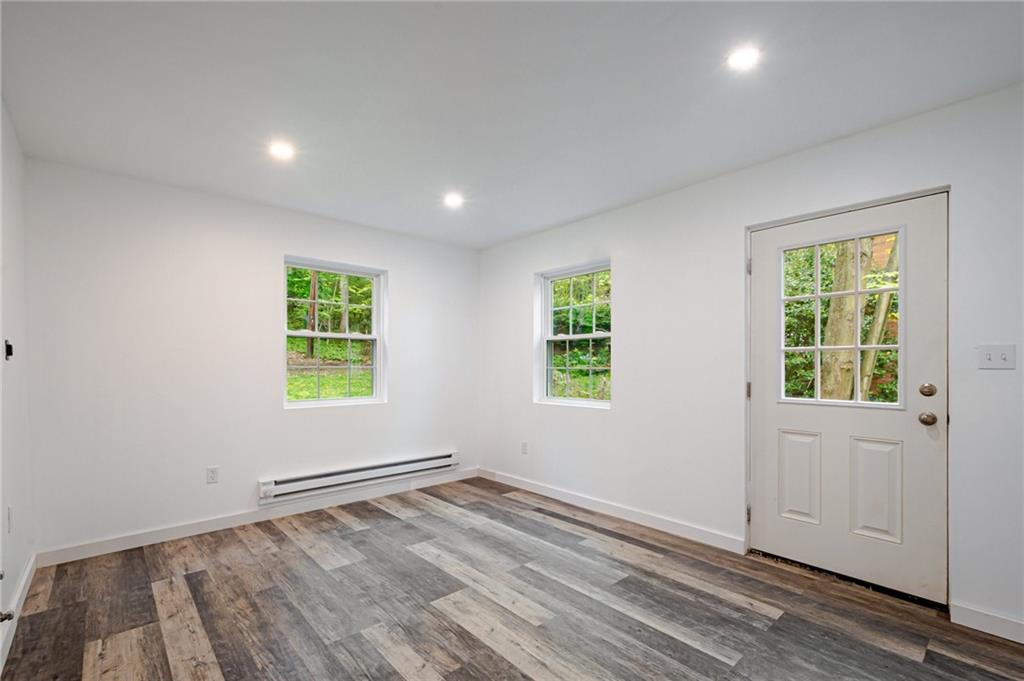 1611 Branning Road Pittsburgh, PA 15235 - Photo 13 of 38 an empty room with windows