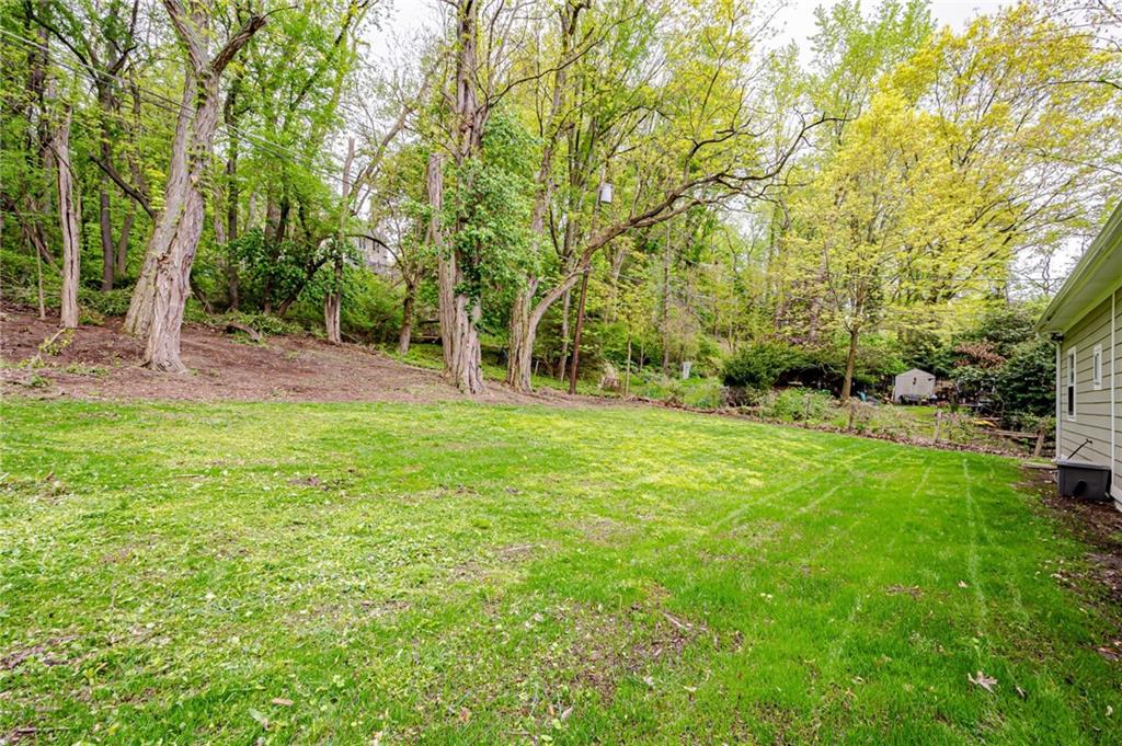 1611 Branning Road Pittsburgh, PA 15235 - Photo 36 of 38 a backyard of a house with lots of green space