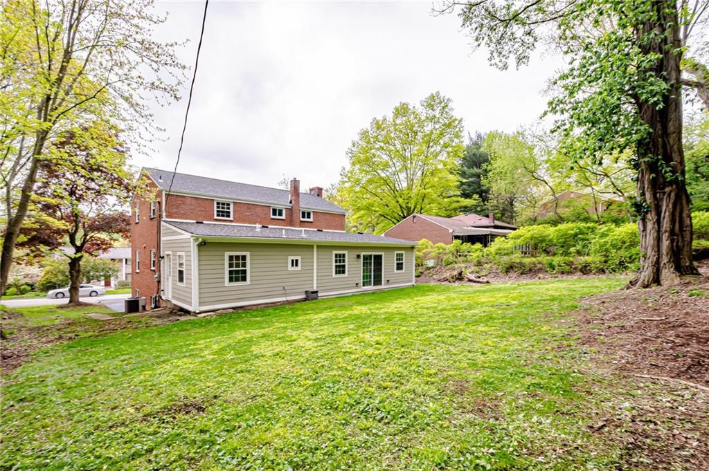 1611 Branning Road Pittsburgh, PA 15235 - Photo 37 of 38 a view of a house with a yard and large trees