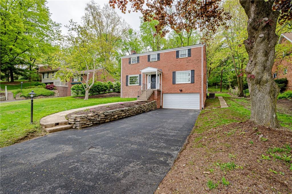 1611 Branning Road Pittsburgh, PA 15235 - Photo 38 of 38 a view of a house with a yard and large tree