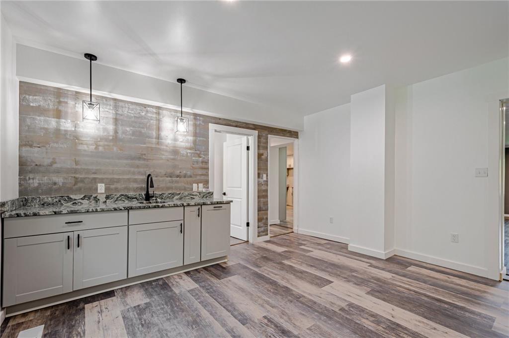 1611 Branning Road Pittsburgh, PA 15235 - Photo 10 of 38 a bathroom with a sink and a mirror