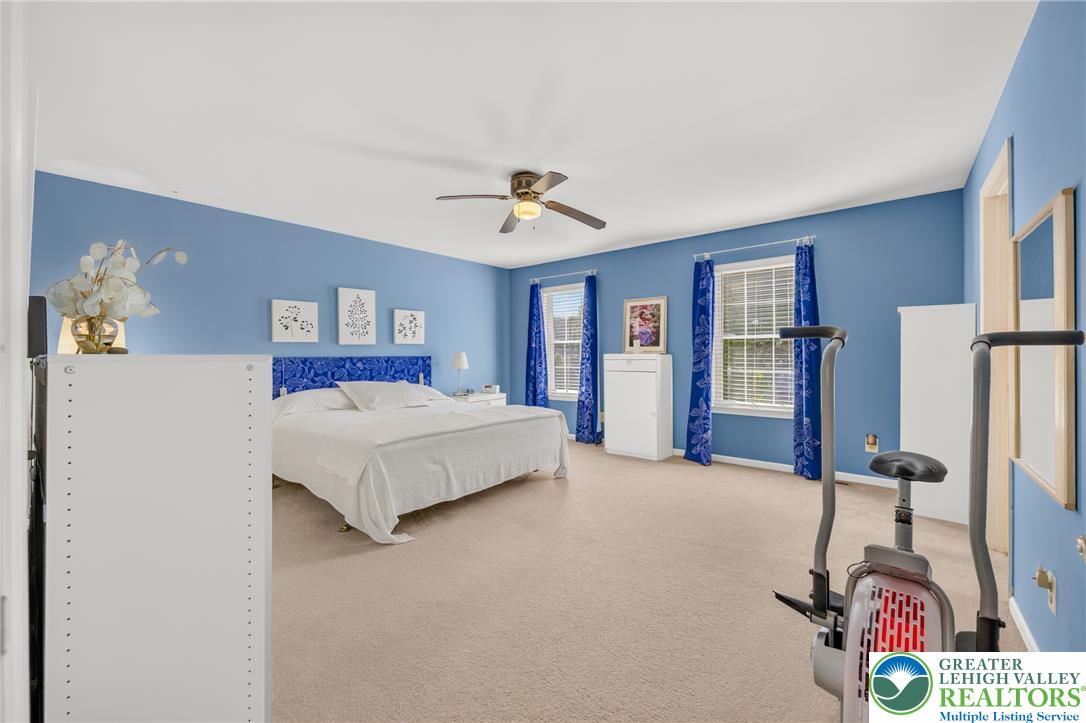 1702 Red Bud Road Quakertown, PA 18951 - Photo 32 of 68 A tranquil bedroom space awaits, complete with soft carpeting and ample natural light.