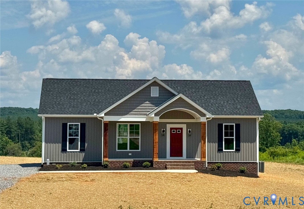 8666 Hat Creek Road Brookneal, VA 24528 - Photo 1 of 38 a front view of a house with a yard