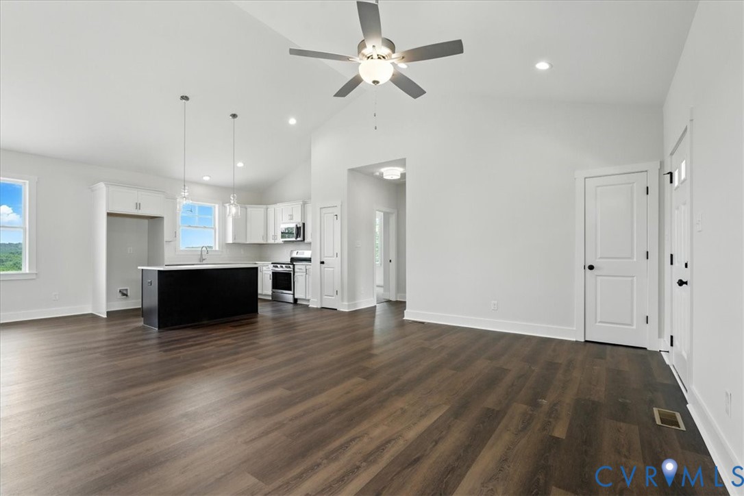 8666 Hat Creek Road Brookneal, VA 24528 - Photo 15 of 38 a view of kitchen with wooden floor and a window