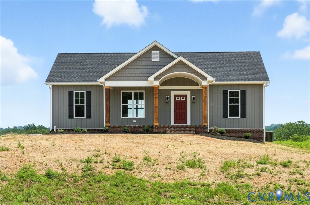 8666 Hat Creek Road Brookneal, VA 24528 - Photo 2 of 38 a front view of a house with a yard
