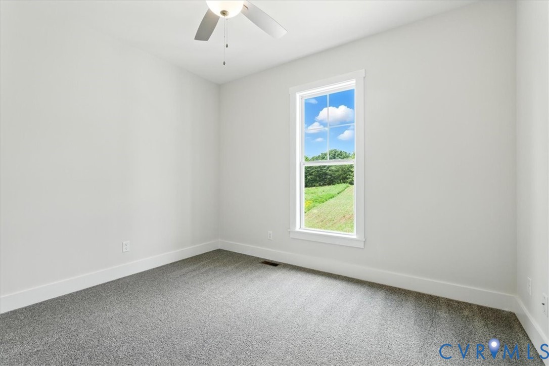 8666 Hat Creek Road Brookneal, VA 24528 - Photo 29 of 38 an empty room with a window
