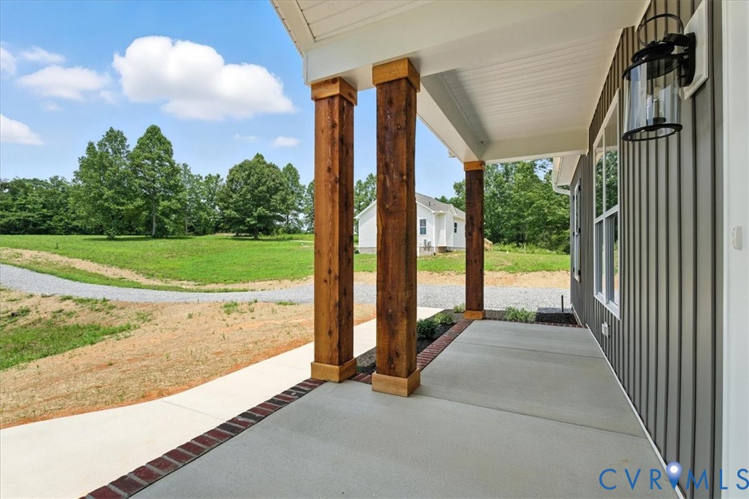 8666 Hat Creek Road Brookneal, VA 24528 - Photo 7 of 38 a view of backyard with green space