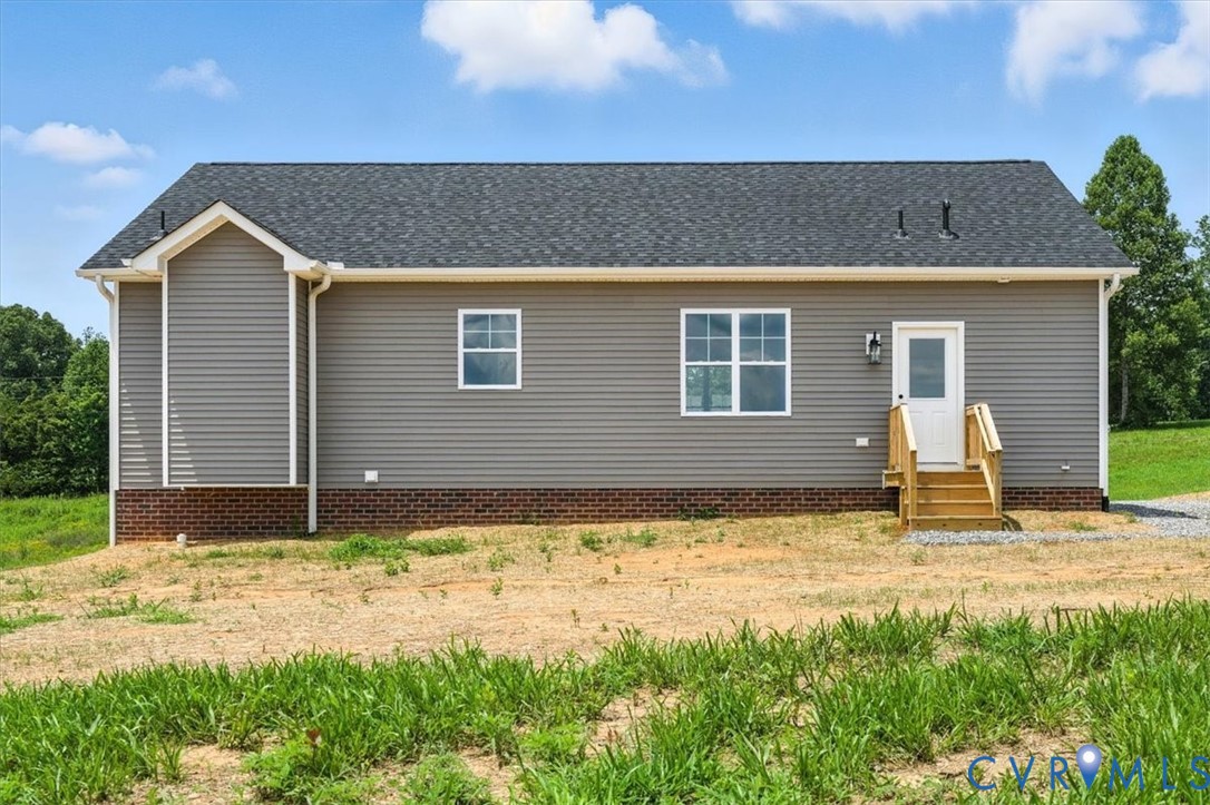 8666 Hat Creek Road Brookneal, VA 24528 - Photo 10 of 38 a house view with a outdoor space