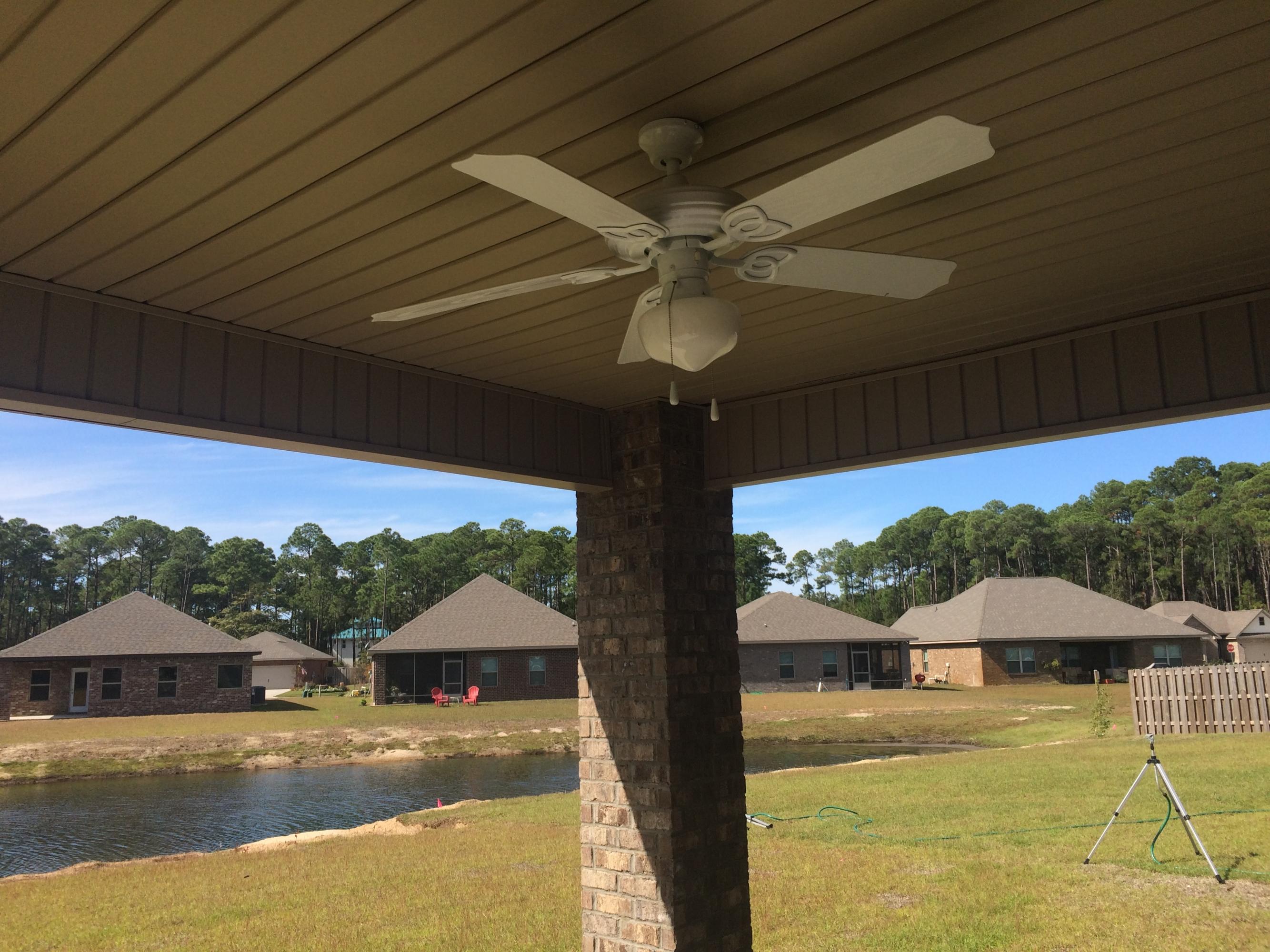389 Pin Oak Loop Santa Rosa Beach, FL 32459 - Photo 18 of 19 a view of a house with a yard swimming pool and outdoor space