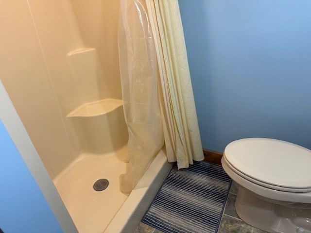 46 Finn Park Road Rutland, MA 01543 - Photo 13 of 28 a bathroom with a tub and toilet