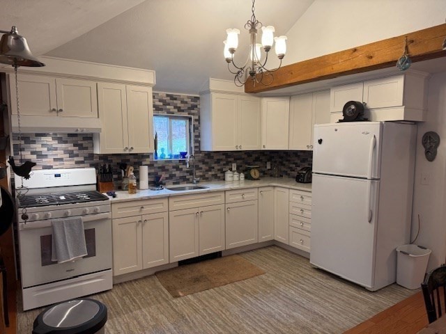 46 Finn Park Road Rutland, MA 01543 - Photo 8 of 28 a kitchen with stainless steel appliances granite countertop a refrigerator a stove a sink and white cabinets