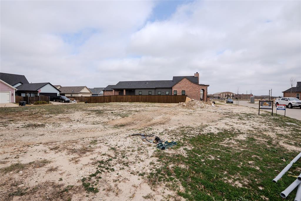 405 Garrett Way Midlothian, TX 76065 - Photo 17 of 26 a view of a lake with houses