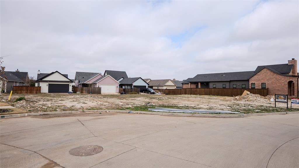 405 Garrett Way Midlothian, TX 76065 - Photo 19 of 26 a view of houses with snow