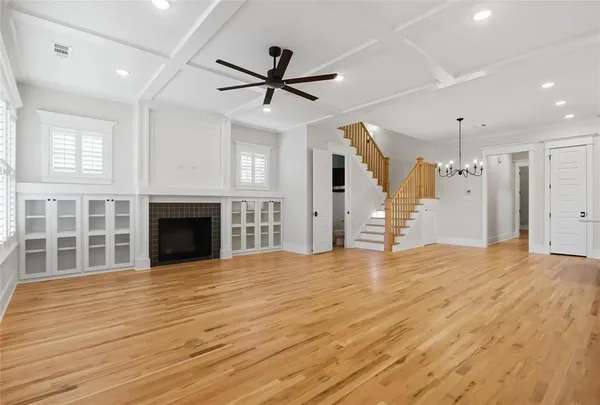 a view of a hallway with windows