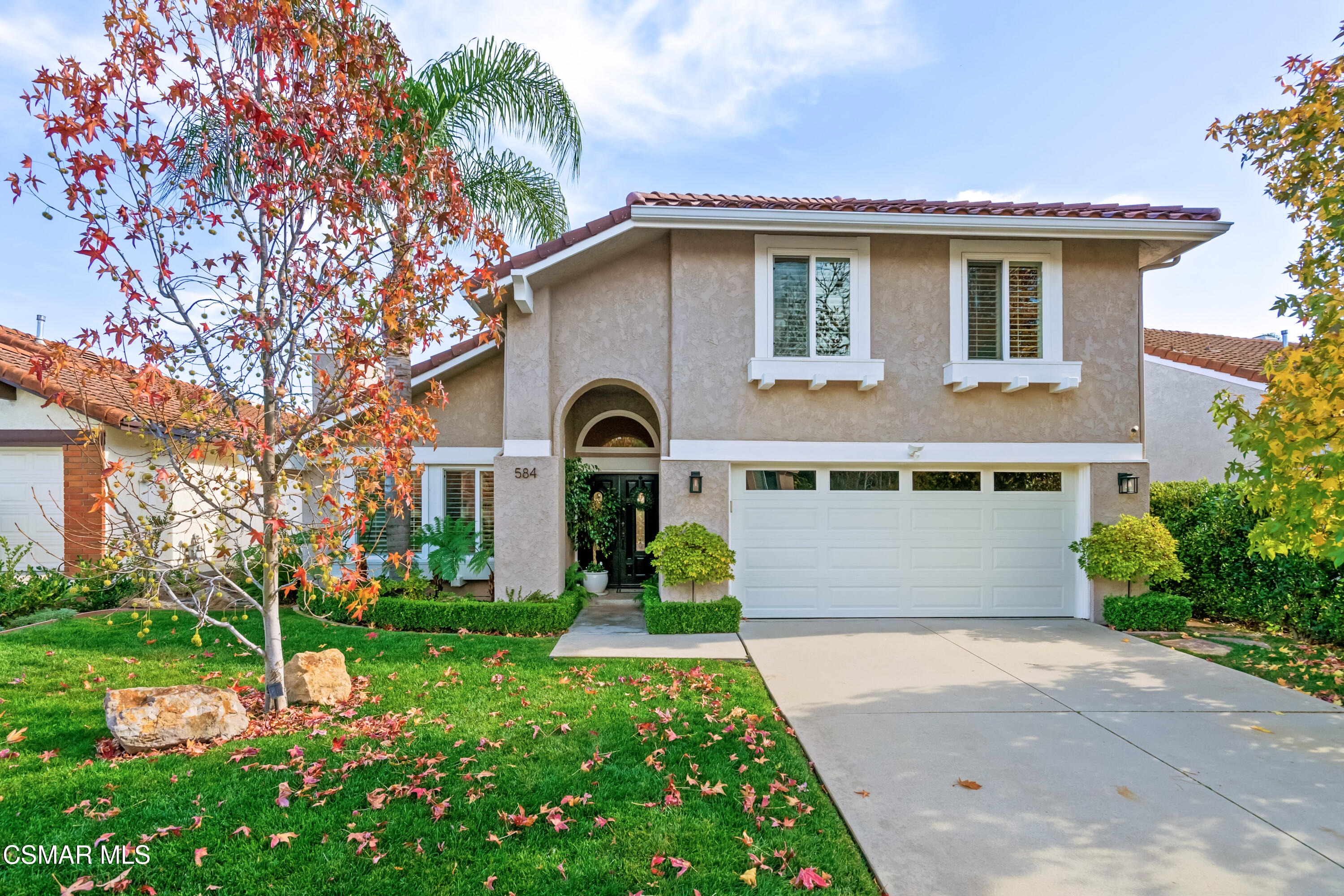 584 Fresh Meadows Road Simi Valley, CA 93065 - Photo 1 of 29 a front view of a house with garden