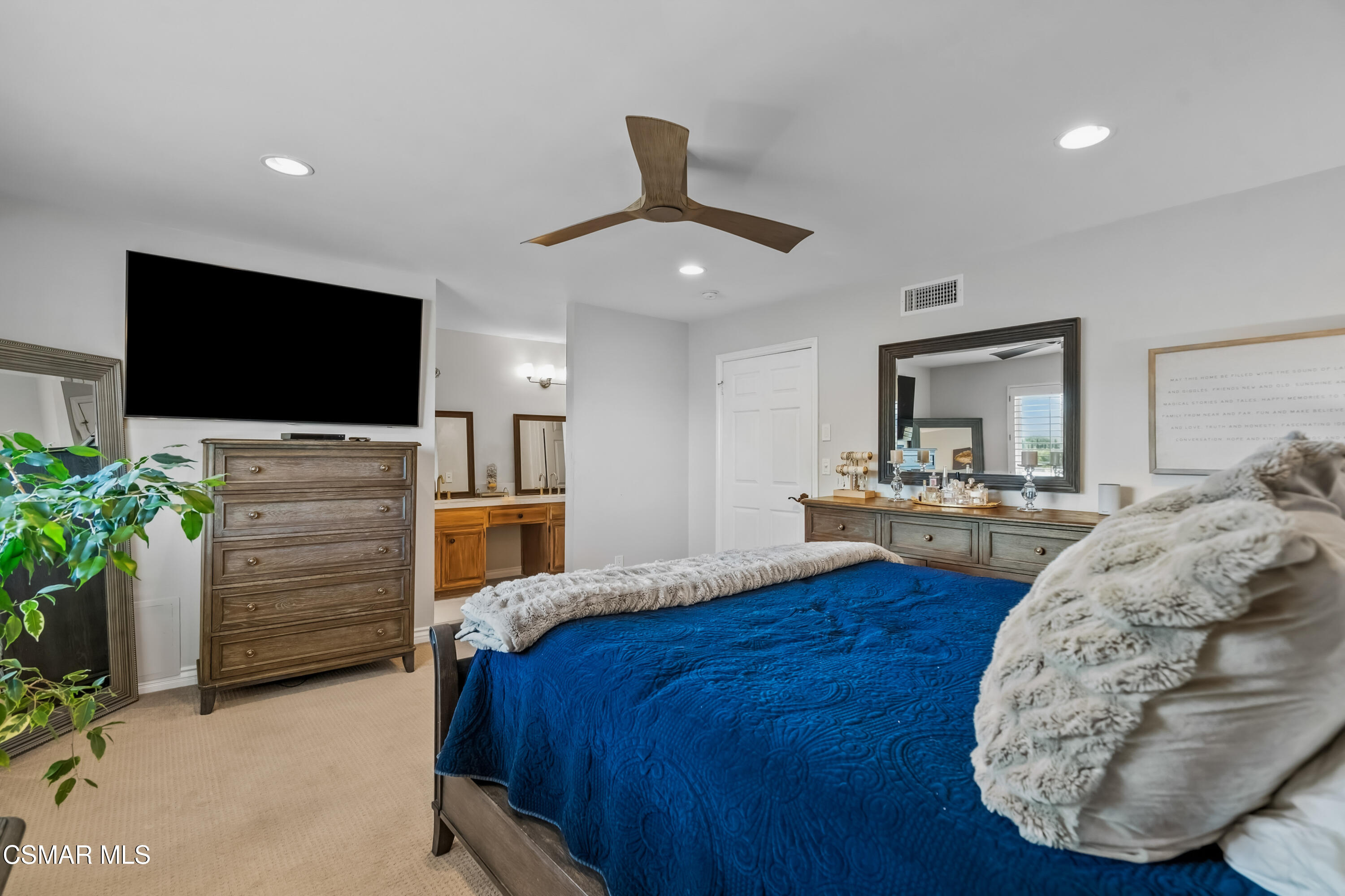 584 Fresh Meadows Road Simi Valley, CA 93065 - Photo 21 of 29 a bedroom with furniture and a flat screen tv