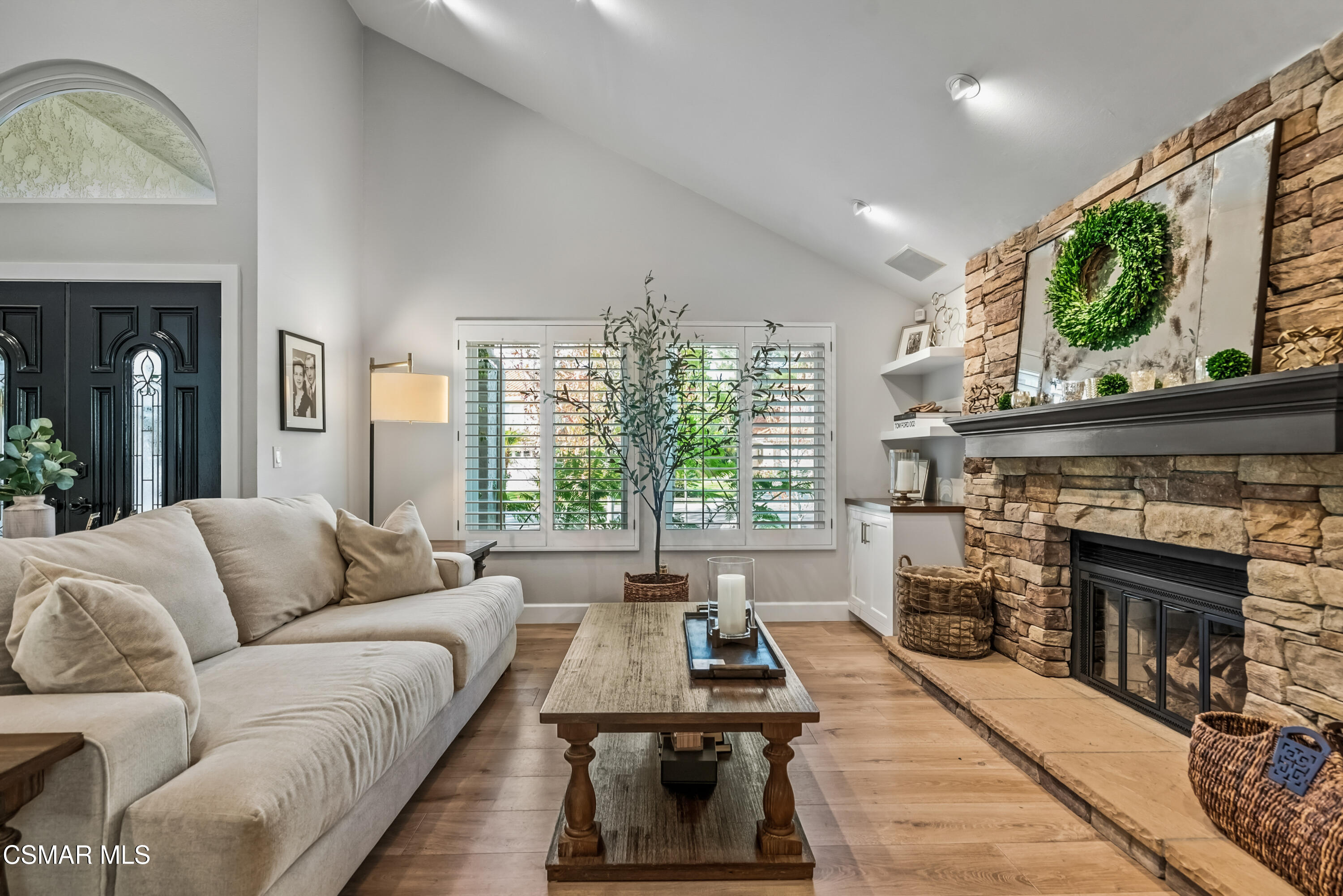584 Fresh Meadows Road Simi Valley, CA 93065 - Photo 6 of 29 a living room with furniture a window and a fireplace