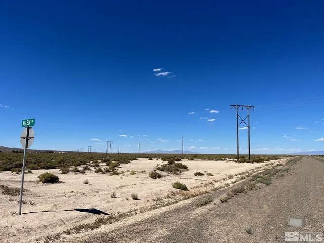 a view of a snow in the yard