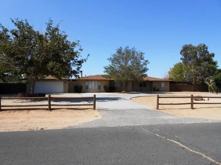 14136 Hopi Road Apple Valley, CA 92307 - Photo 1 of 1 a view of outdoor space with seating