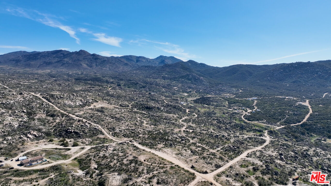 51919 Tule Peak Road Aguanga, CA 92536 - Photo 16 of 44 a view of a large mountain with a mountain in the background