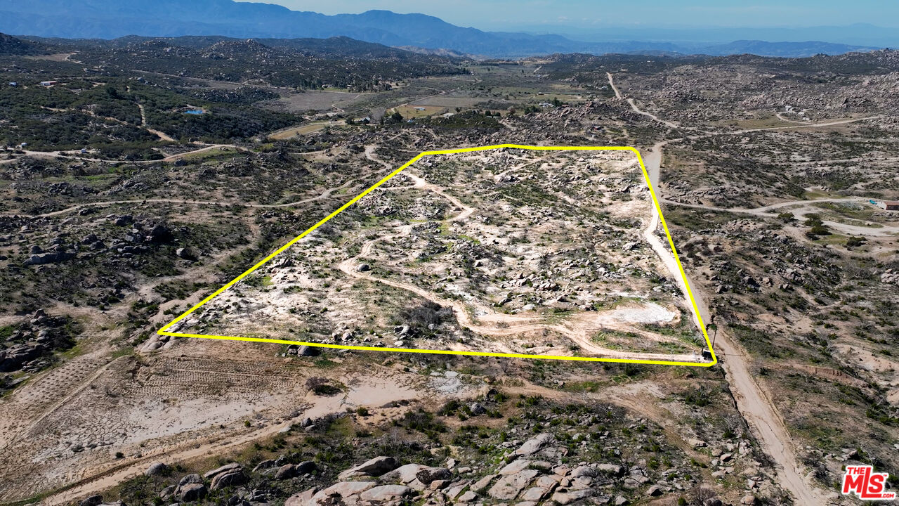 51919 Tule Peak Road Aguanga, CA 92536 - Photo 2 of 44 a view of a swimming pool with a mountain